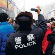 Kinesiske myndigheter filmer alle demonstranter, Beijing 20. februar 2011.